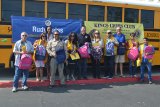 Assembly Member Rudy Salas joins Kings Lions Club members and others at the annual "Stuff the Bus" event Saturday at the Lemoore Kmart.